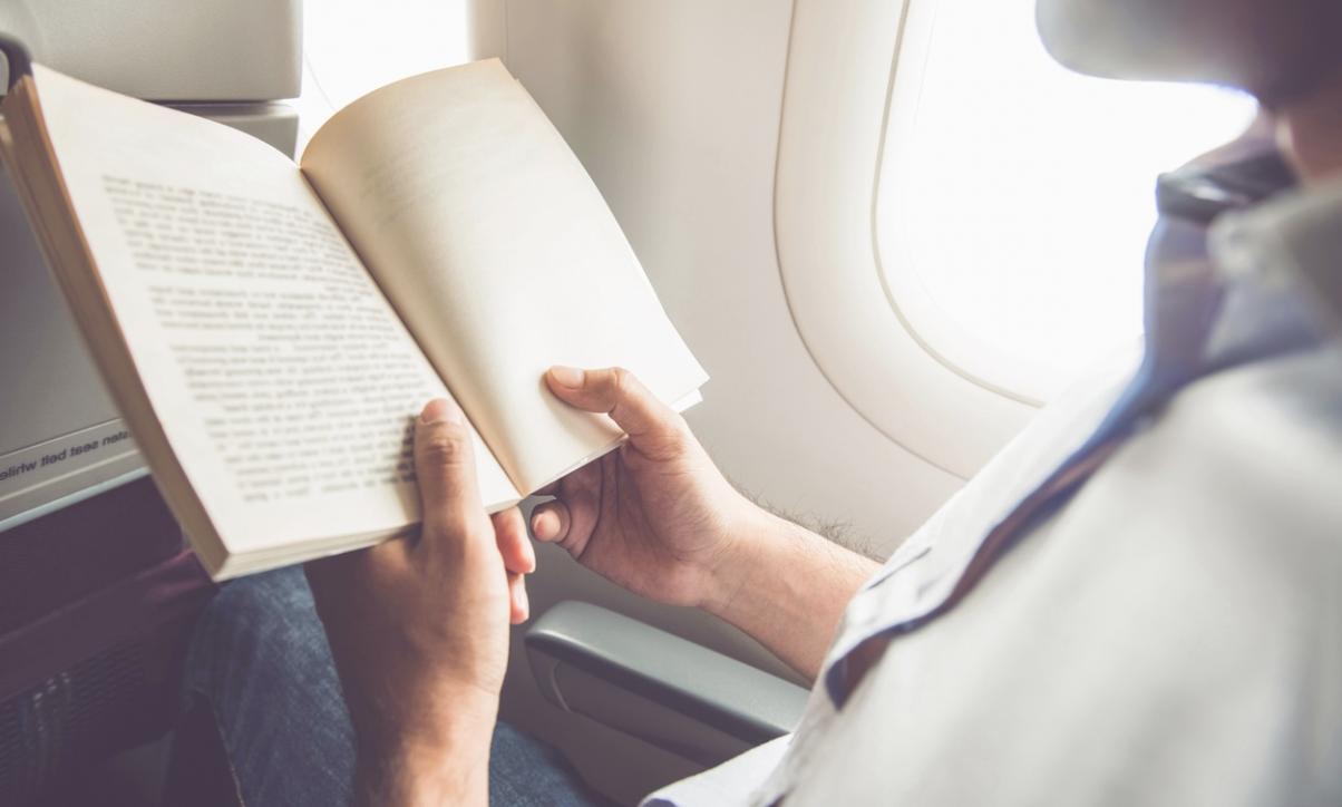 organized workspace with dual monitors and natural lighting for remote learning environment