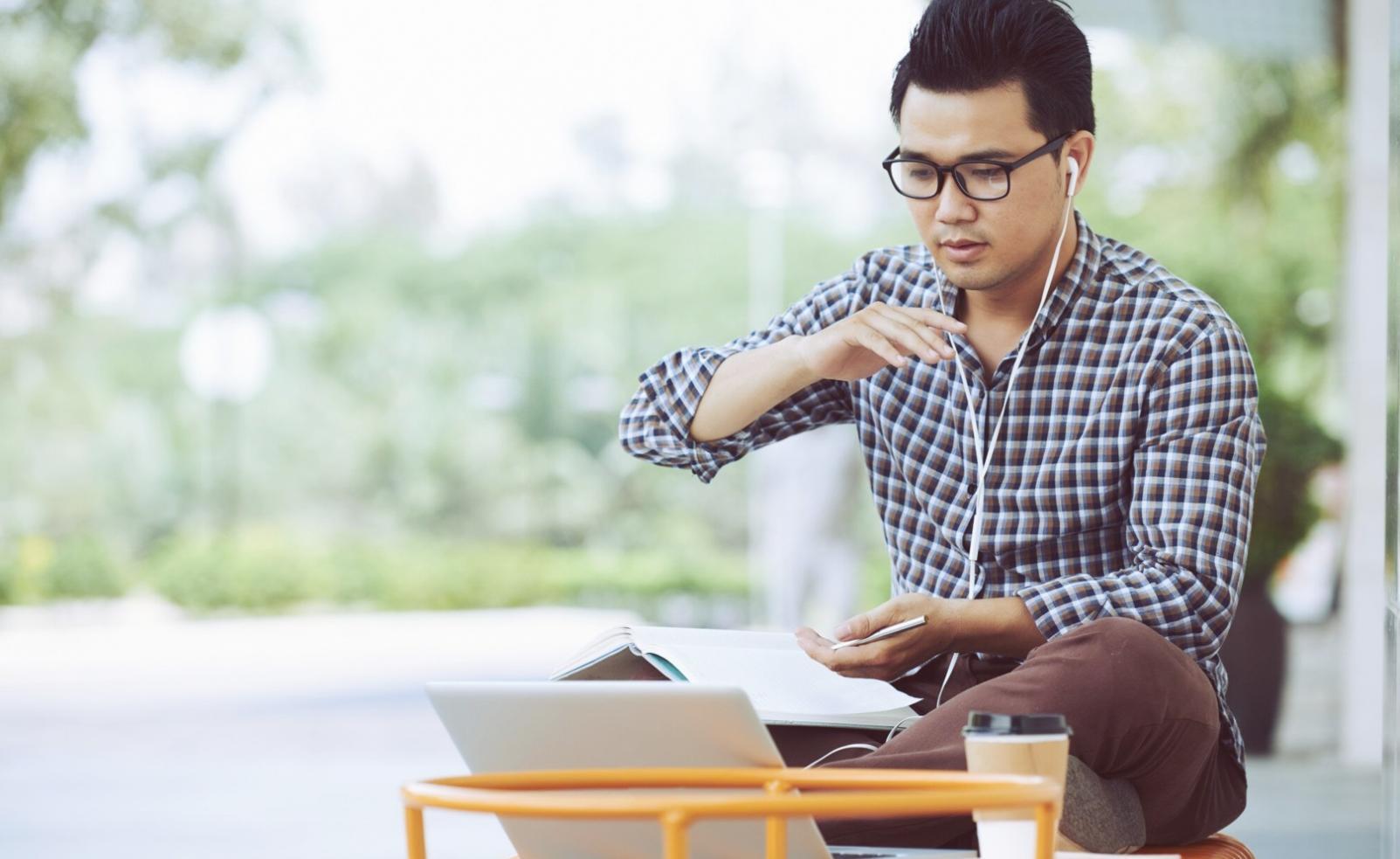 Early classroom setup at flashpulsedrive showing students working on laptops with project-based learning materials